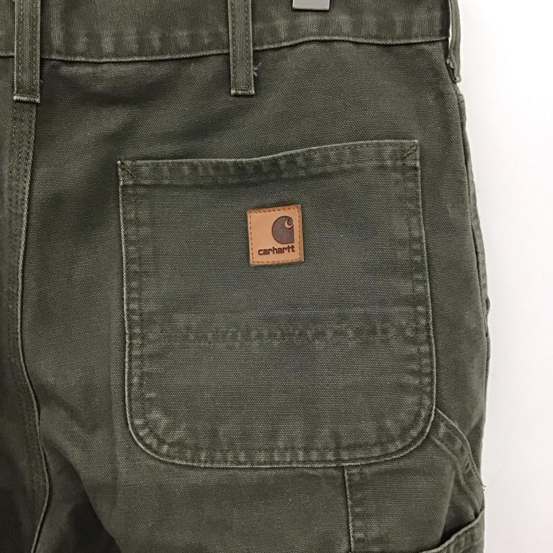 カーハート Carhartt パンツ ワークパンツ、ペインターパンツ ワイドパンツ カジュアルパンツ ワークパンツ 34 ロゴ、文字 カーキ / カーキ /  メンズ USED 古着 中古 10148567