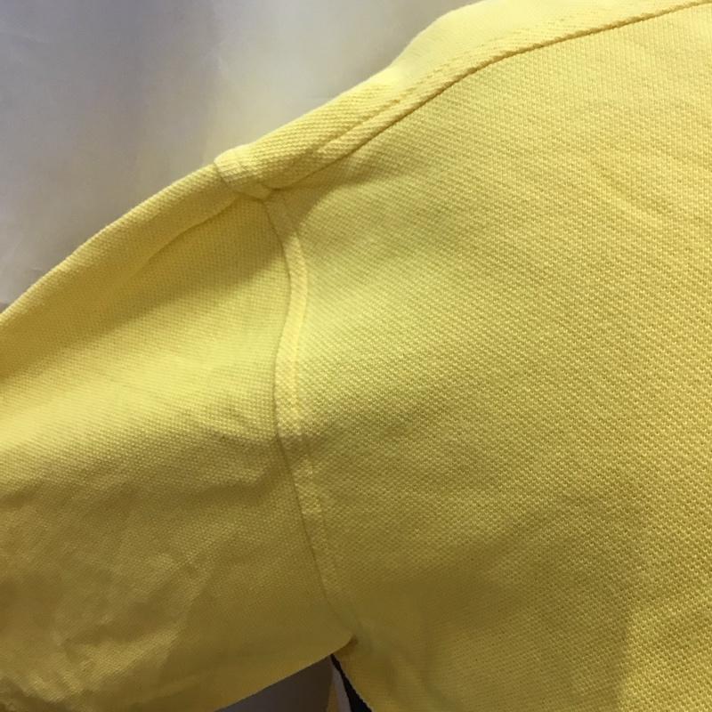 トミーヒルフィガー TOMMY HILFIGER ポロシャツ 半袖 半袖ポロシャツ カラーシャツ 半袖カットソー XL ロゴ、文字 黄 / イエロー /  メンズ USED 古着 中古 10113223