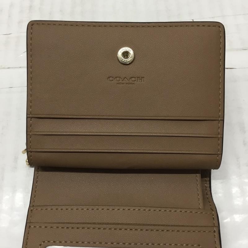 コーチ COACH 財布 二つ折り ロゴ、文字 ベージュ / ベージュ /  レディース USED 古着 中古 10109759