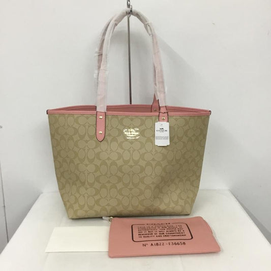 コーチ COACH トートバッグ トートバッグ F36658 リバーシブル シグネチャー ロゴ 総柄 ベージュ / ベージュ / X 桃 / ピンク /  レディース USED 古着 中古 10140050