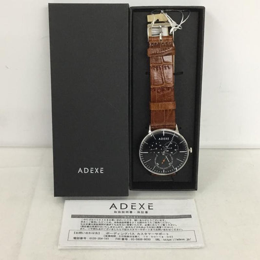 アデクス ADEXE 腕時計 アナログ（クォーツ式） 1868A-04 レザーバンド 箱有 ロゴ、文字 茶 / ブラウン / X 黒 / ブラック /  メンズ USED 古着 中古 10135059