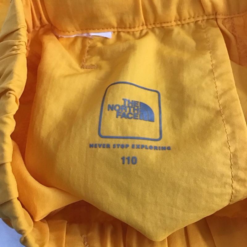 ザノースフェイス THE NORTH FACE パンツ ショートパンツ 110cm ロゴ、文字 X プリント 黄 / イエロー /  ボーイズ USED 古着 中古 10130365