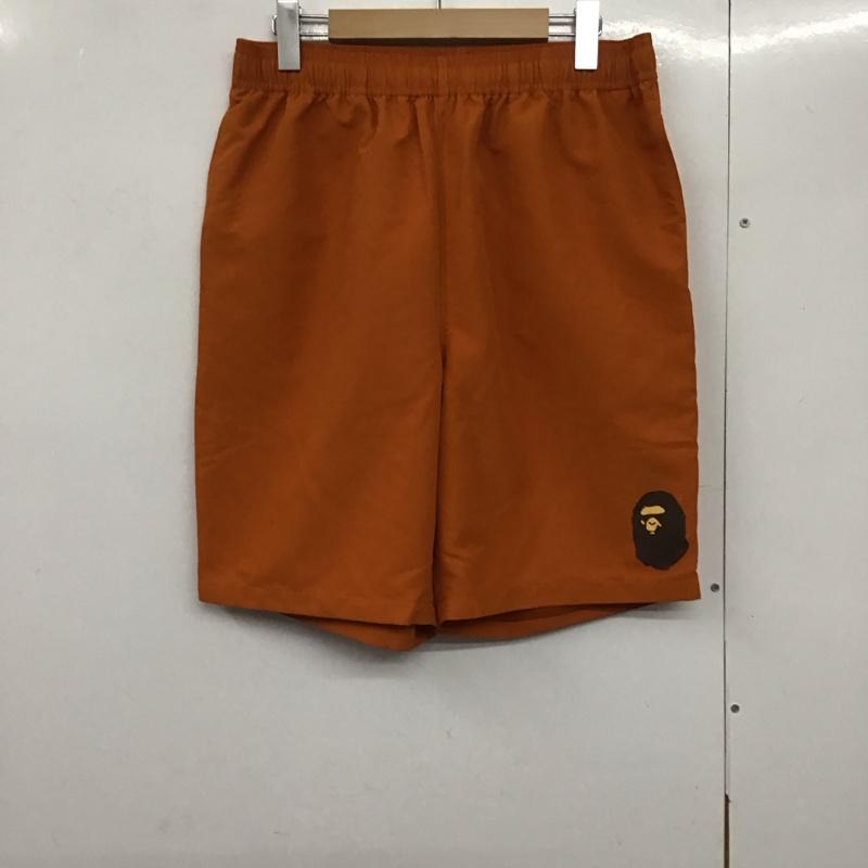アベイシングエイプ A BATHING APE パンツ ショートパンツ ハーフパンツ ショートパンツ カジュアルパンツ L ロゴ、文字 橙 / オレンジ /  メンズ USED 古着 中古 10142630