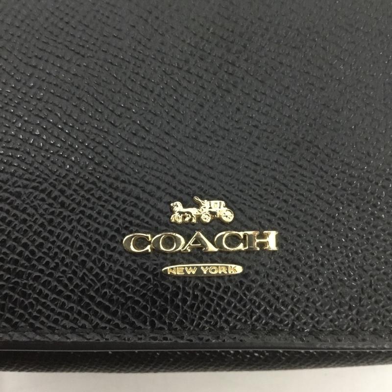 コーチ COACH 財布 コンパクト財布 三つ折り ラウンドジップ ロゴ、文字 黒 / ブラック /  レディース USED 古着 中古 10126583