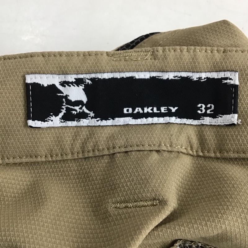 オークリー OAKLEY パンツ ワークパンツ、ペインターパンツ スリムパンツ ストレッチパンツ カジュアルパンツ 32インチ ロゴ、文字 ベージュ / ベージュ /  メンズ USED 古着 中古 10140280