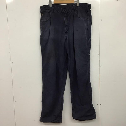 カーハート Carhartt パンツ ワークパンツ、ペインターパンツ ワークパンツ ワイドパンツ カジュアルパンツ 40インチ ロゴ、文字 紺 / ネイビー /  メンズ USED 古着 中古 10144971