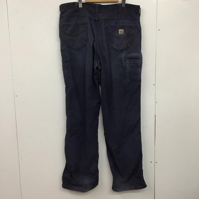 カーハート Carhartt パンツ ワークパンツ、ペインターパンツ ワークパンツ ワイドパンツ カジュアルパンツ 40インチ ロゴ、文字 紺 / ネイビー /  メンズ USED 古着 中古 10144971
