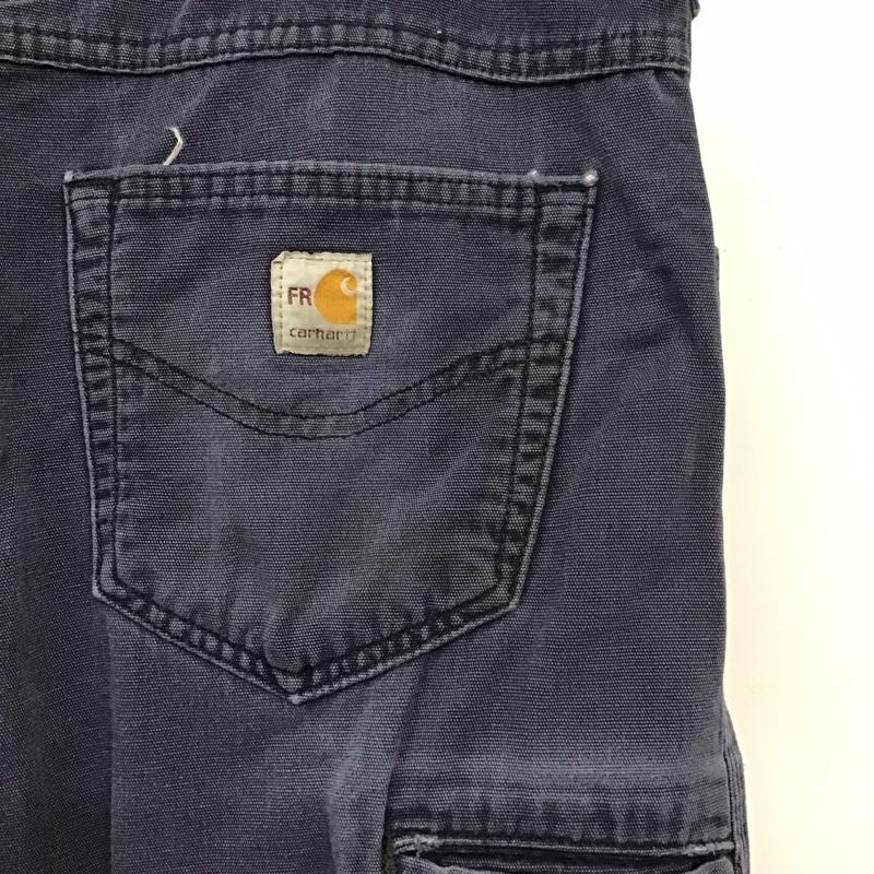 カーハート Carhartt パンツ ワークパンツ、ペインターパンツ ワークパンツ ワイドパンツ カジュアルパンツ 40インチ ロゴ、文字 紺 / ネイビー /  メンズ USED 古着 中古 10144971