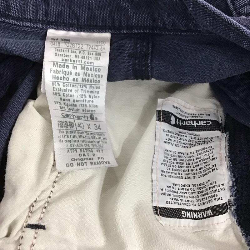 カーハート Carhartt パンツ ワークパンツ、ペインターパンツ ワークパンツ ワイドパンツ カジュアルパンツ 40インチ ロゴ、文字 紺 / ネイビー /  メンズ USED 古着 中古 10144971