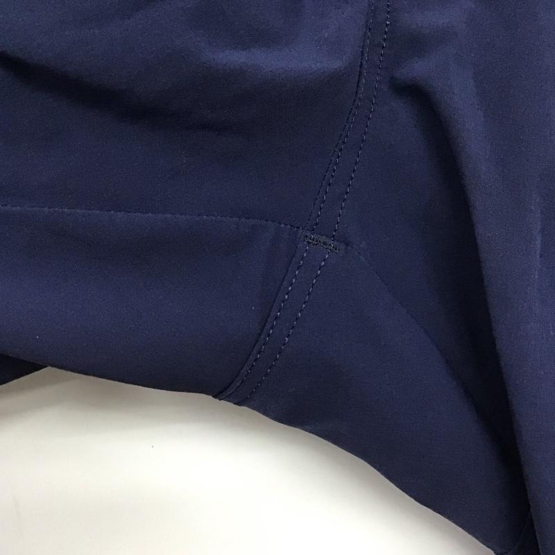 オークリー OAKLEY ボトムス ボトムス 422418JP ストレッチパンツ スポーツウェア ワンポイント 紺 / ネイビー /  メンズ USED 古着 中古 10146364