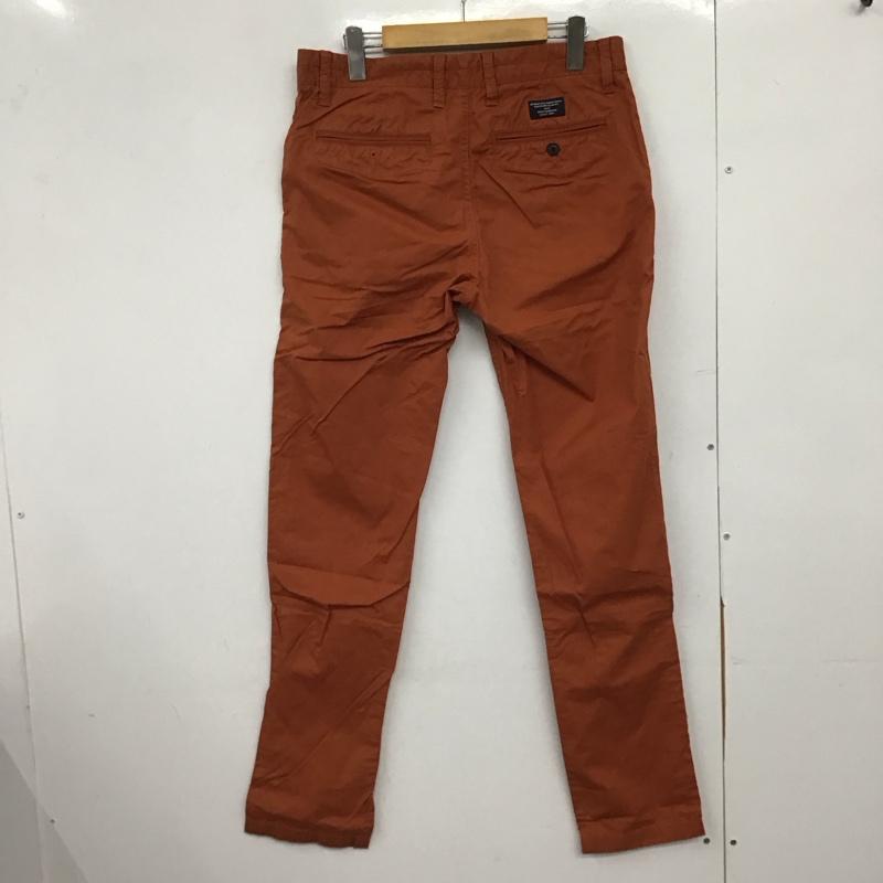 アルマーニエクスチェンジ ARMANI EXCHANGE パンツ ワークパンツ、ペインターパンツ カジュアルパンツ スリムパンツ ストレッチパンツ 31インチ 無地 橙 / オレンジ /  メンズ USED 古着 中古 10147082