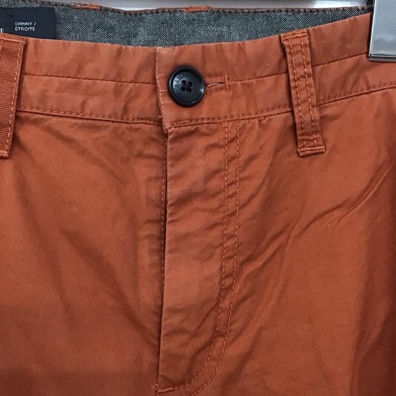 アルマーニエクスチェンジ ARMANI EXCHANGE パンツ ワークパンツ、ペインターパンツ カジュアルパンツ スリムパンツ ストレッチパンツ 31インチ 無地 橙 / オレンジ /  メンズ USED 古着 中古 10147082