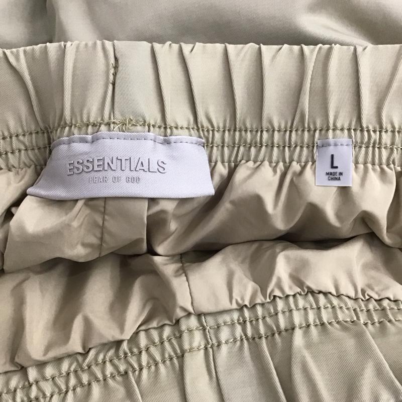 エッセンシャルズ ESSENTIALS パンツ ワークパンツ、ペインターパンツ ナイロンパンツ ワイドパンツ カジュアルパンツ L ロゴ、文字 ベージュ / ベージュ /  メンズ USED 古着 中古 10148517