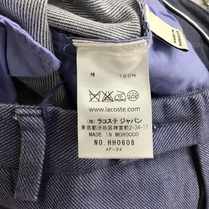 ラコステ LACOSTE パンツ チノパン チノパン スリムパンツ カジュアルパンツ 38 無地 青 / ブルー /  メンズ USED 古着 中古 10151354