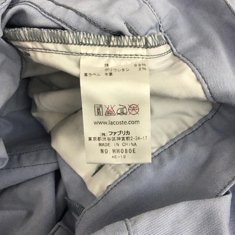 ラコステ LACOSTE パンツ チノパン スリムパンツ ストレッチパンツ カジュアルパンツ 無地 水色 / ライトブルー /  メンズ USED 古着 中古 10151359