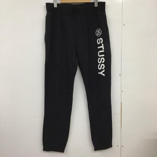 ステューシー STUSSY パンツ ワークパンツ、ペインターパンツ スウェットパンツ ワイドパンツ カジュアルパンツ M ロゴ、文字 黒 / ブラック / black メンズ USED 古着 中古 10151570