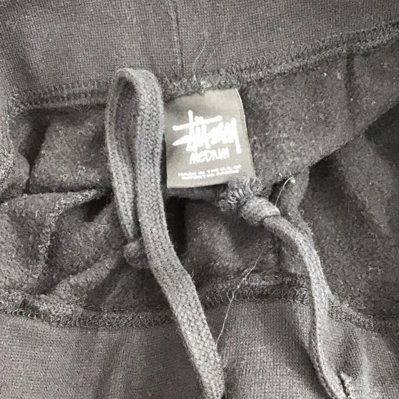 ステューシー STUSSY パンツ ワークパンツ、ペインターパンツ スウェットパンツ ワイドパンツ カジュアルパンツ M ロゴ、文字 黒 / ブラック / black メンズ USED 古着 中古 10151570