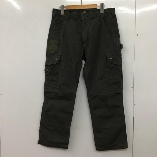 カーハート Carhartt パンツ ワークパンツ、ペインターパンツ ワークパンツ ワイドパンツ カジュアルパンツ カーゴパンツ 32インチ ロゴ、文字 カーキ / カーキ / khaki メンズ USED 古着 中古 10152172