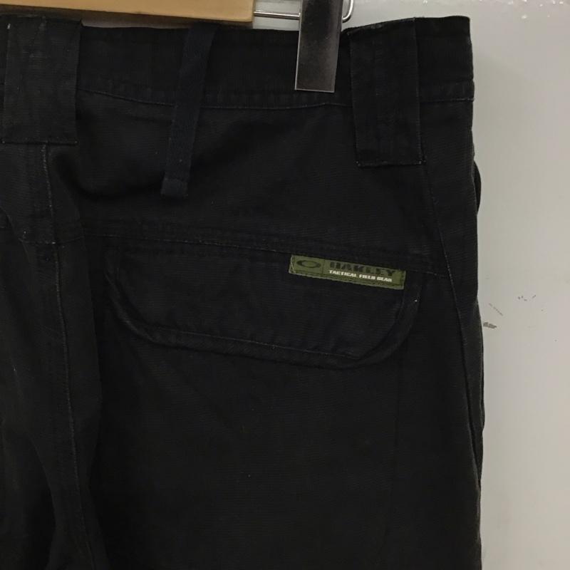 オークリー OAKLEY パンツ ワークパンツ、ペインターパンツ ワークパンツ ワイドパンツ カジュアルパンツ カーゴパンツ 32インチ ロゴ、文字 ダークグレー / ダークグレー / メンズ USED 古着 中古 10155903