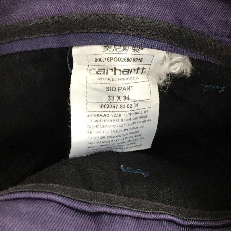 カーハート Carhartt パンツ ワークパンツ、ペインターパンツ ワークパンツ ワイドパンツ カジュアルパンツ ストレッチ 33インチ ロゴ、文字 紺 / ネイビー / navy メンズ USED 古着 中古 10156578