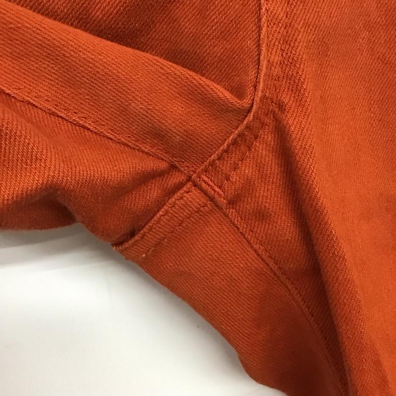 クラ 倉 パンツ デニム、ジーンズ デニムパンツ スリムパンツ カジュアルパンツ ストレッチパンツ 34インチ ロゴ、文字 橙 / オレンジ / orange メンズ USED 古着 中古 10156579