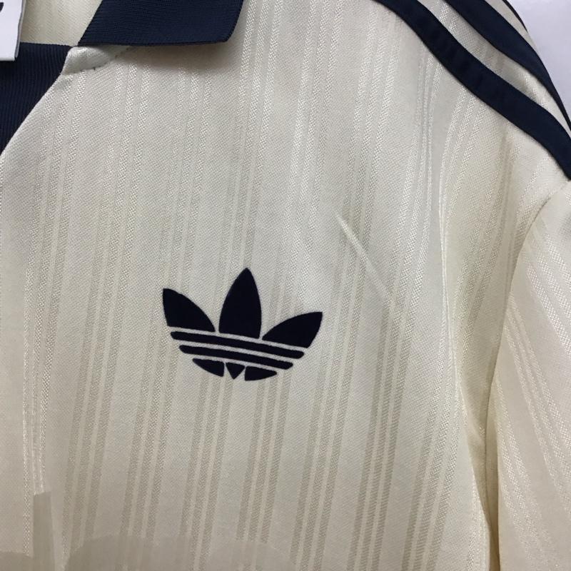 アディダス adidas ポロシャツ 半袖 半袖ポロシャツ カラーシャツ 半袖カットソー ロゴ、文字 アイボリー / アイボリー / メンズ USED 古着 中古 10156677
