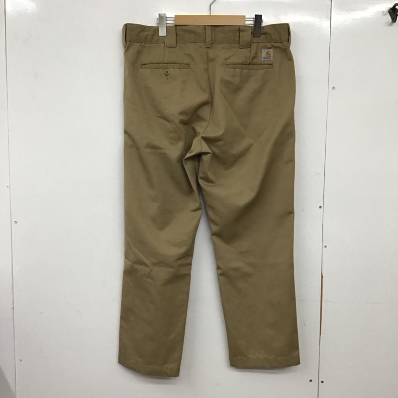 カーハート Carhartt パンツ ワークパンツ、ペインターパンツ ワークパンツ ワイドパンツ カジュアルパンツ 34 ロゴ、文字 ベージュ / ベージュ / beige メンズ USED 古着 中古 10157666
