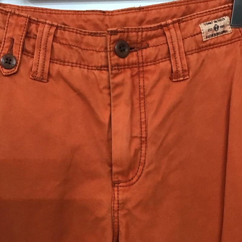 トミーヒルフィガー TOMMY HILFIGER パンツ ワークパンツ、ペインターパンツ ワークパンツ ワイドパンツ カジュアルパンツ 32インチ ロゴ、文字 橙 / オレンジ / orange メンズ USED 古着 中古 10158162