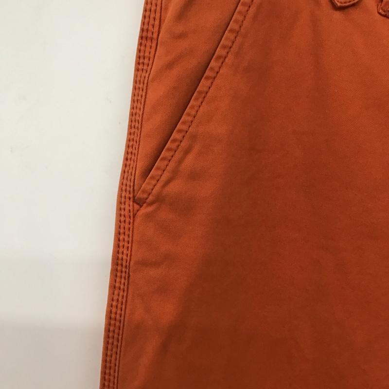 トミーヒルフィガー TOMMY HILFIGER パンツ ワークパンツ、ペインターパンツ ワークパンツ ワイドパンツ カジュアルパンツ 32インチ ロゴ、文字 橙 / オレンジ / orange メンズ USED 古着 中古 10158162
