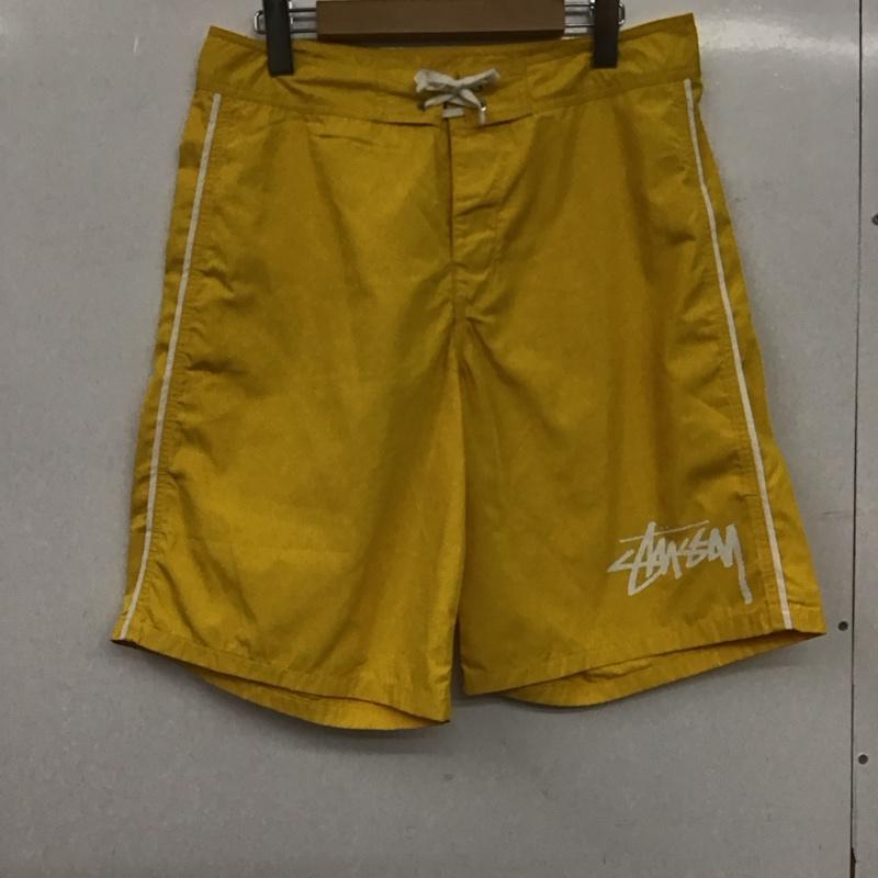 ステューシー STUSSY パンツ ショートパンツ ショートパンツ ハーフパンツ カジュアルパンツ 30インチ ロゴ、文字 黄 / イエロー / yellow メンズ USED 古着 中古 10158963