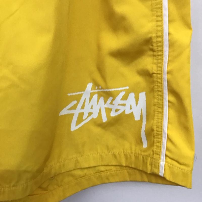 ステューシー STUSSY パンツ ショートパンツ ショートパンツ ハーフパンツ カジュアルパンツ 30インチ ロゴ、文字 黄 / イエロー / yellow メンズ USED 古着 中古 10158963