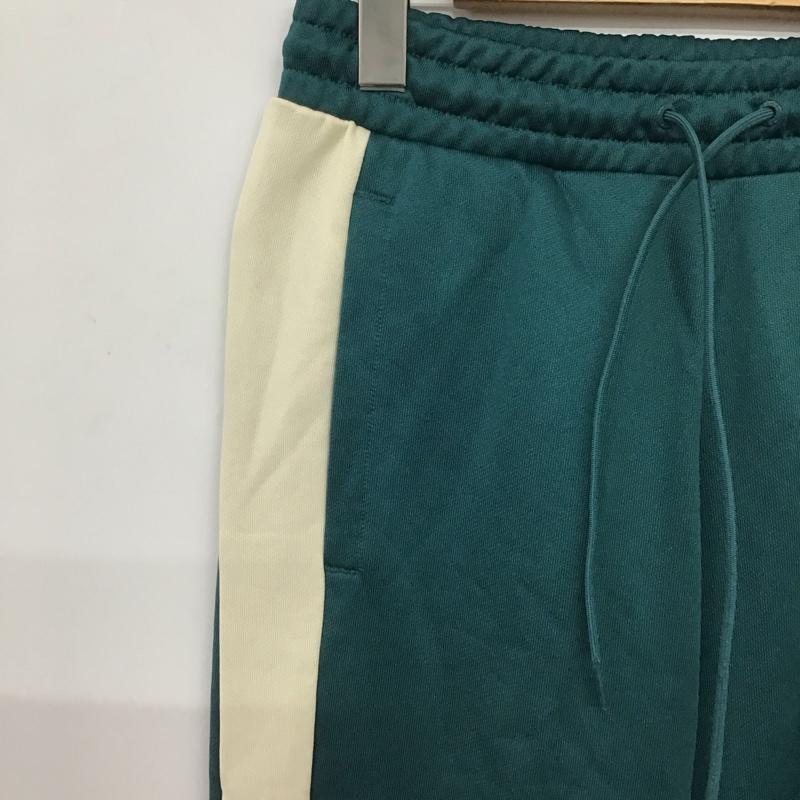 プーマ PUMA パンツ ワークパンツ、ペインターパンツ ワイドパンツ ジャージ スポーツウェア M ロゴ、文字 緑 / グリーン / green メンズ USED 古着 中古 10159276
