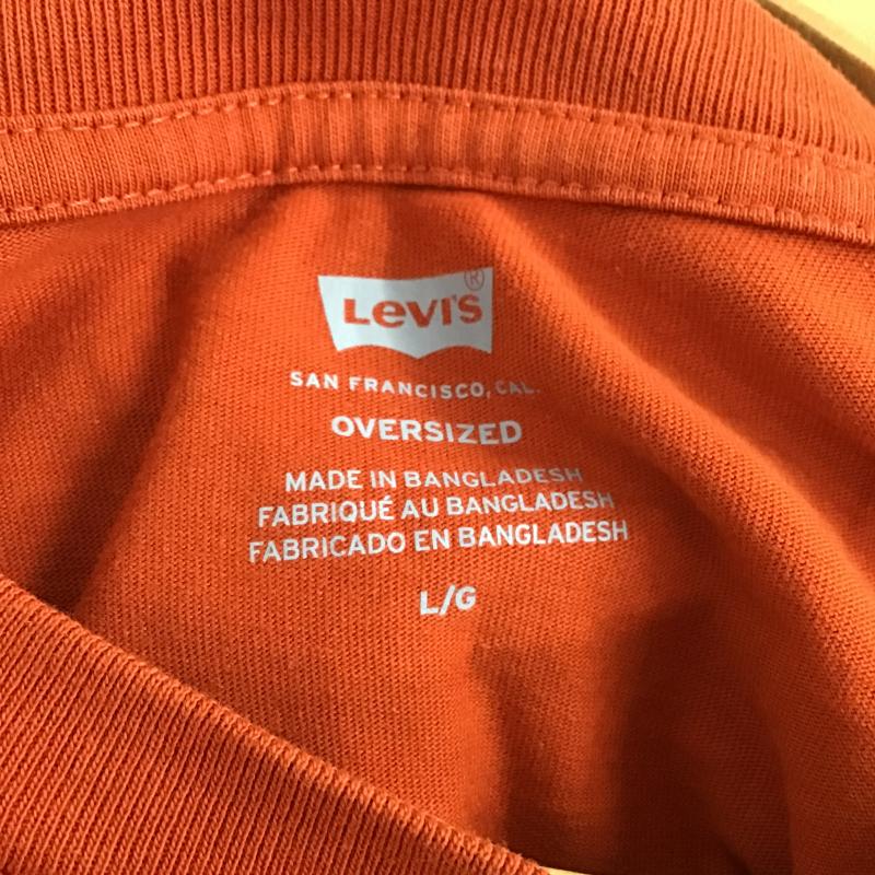 リーバイス Levi s Tシャツ 半袖 半袖カットソー プリントTシャツ クルーネックカットソー L ロゴ、文字 橙 / オレンジ / orange メンズ USED 古着 中古 10160323