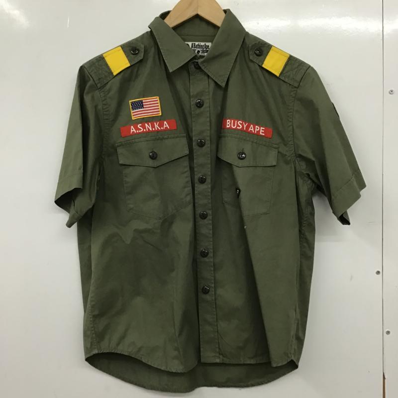 アベイシングエイプ A BATHING APE シャツ、ブラウス 半袖 半袖シャツ プリントシャツ ポケットシャツ M ロゴ、文字 カーキ / カーキ / khaki メンズ USED 古着 中古 10160506