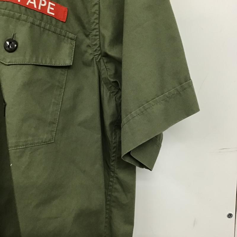 アベイシングエイプ A BATHING APE シャツ、ブラウス 半袖 半袖シャツ プリントシャツ ポケットシャツ M ロゴ、文字 カーキ / カーキ / khaki メンズ USED 古着 中古 10160506
