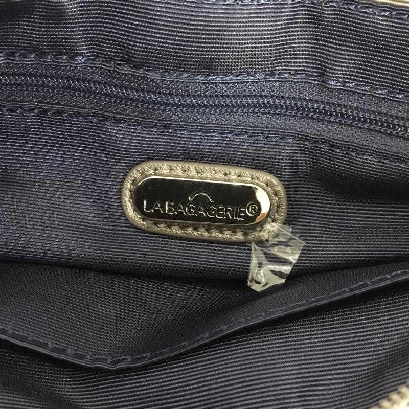 ラ バガジェリー LA BAGAGERIE ハンドバッグ ハンドバッグ ギャザーハンドル ロゴ、文字 銀 / シルバー / silver color レディース USED 古着 中古 10161056