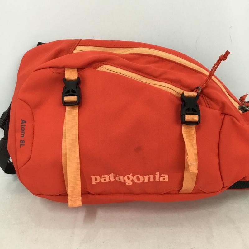 パタゴニア patagonia ボディバッグ ボディバッグ Atom 8L ワンショルダーバッグ スリングバッグ ロゴ、文字 赤 / レッド / red X 橙 / オレンジ / orange メンズ USED 古着 中古 10161434