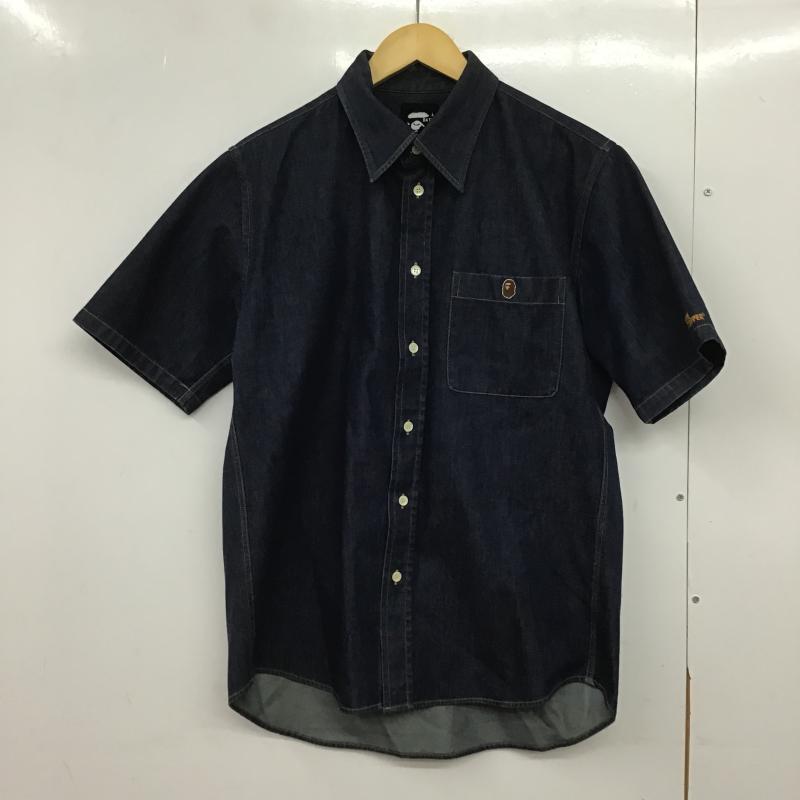 アベイシングエイプ A BATHING APE シャツ、ブラウス 半袖 半袖シャツ デニムシャツ カジュアルシャツ L ロゴ、文字 インディゴ / インディゴ / Indigo メンズ USED 古着 中古 10161525