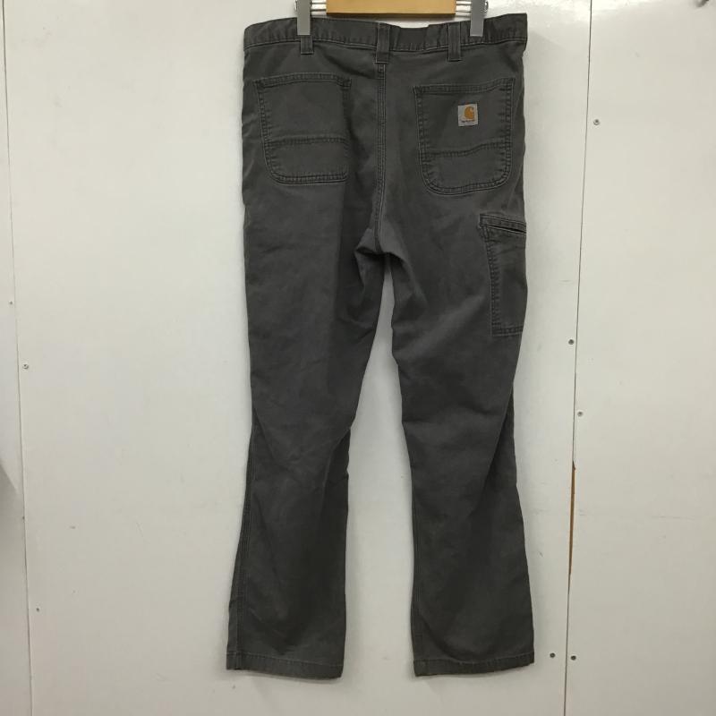 カーハート Carhartt パンツ ワークパンツ、ペインターパンツ ワークパンツ ワイドパンツ カジュアルパンツ 36インチ ロゴ、文字 灰 / グレー / gray メンズ USED 古着 中古 10162088