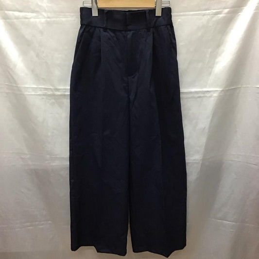 ニューバランス New Balance ボトムス ボトムス JWPL2201 THE CITY ワイドパンツ M ロゴ、文字 紺 / ネイビー /  レディース USED 古着 中古 10112464