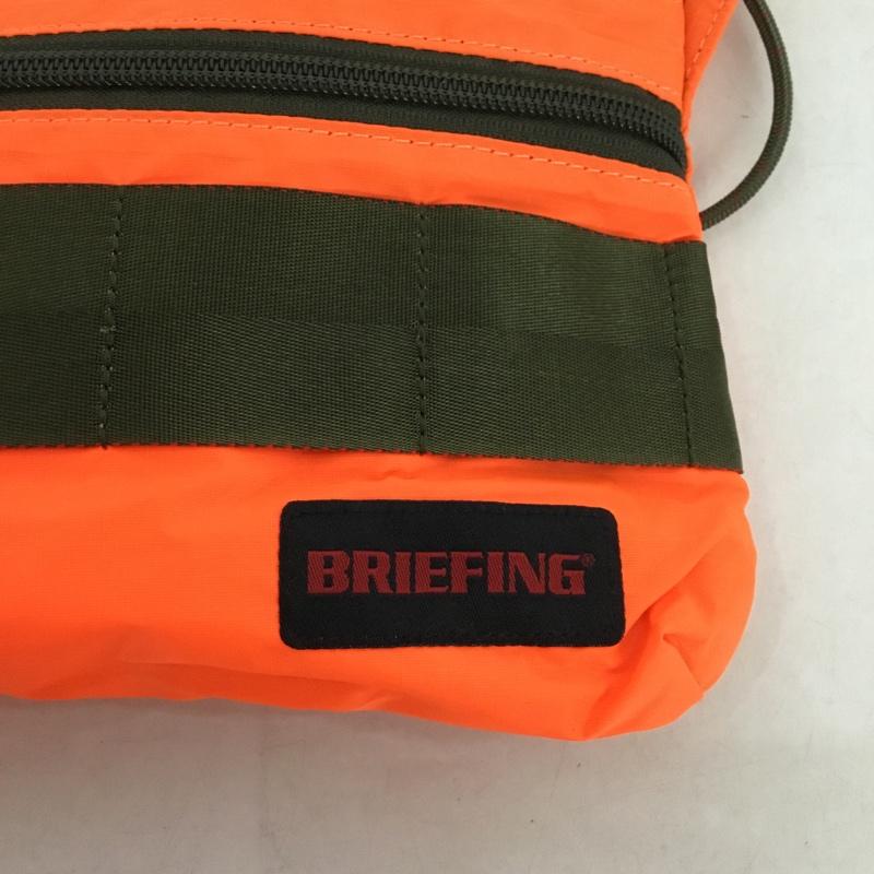 ブリーフィング BRIEFING ショルダーバッグ ショルダーバッグ BRM182201-040-001 SACOCHE S SL PACKABLE タグ有 ロゴ、文字 橙 / オレンジ /  メンズ USED 古着 中古 10145170