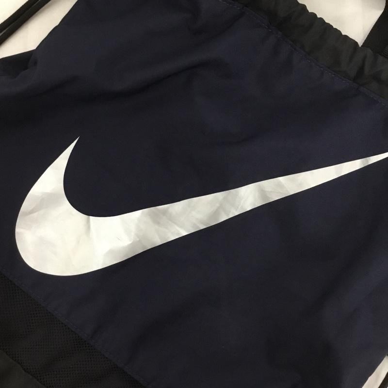 ナイキ NIKE リュックサック、デイパック リュックサック、デイバッグ 1984804-08 ナップサック ジムサック ロゴ、文字 紺 / ネイビー / X 黒 / ブラック /  メンズ USED 古着 中古 10150719