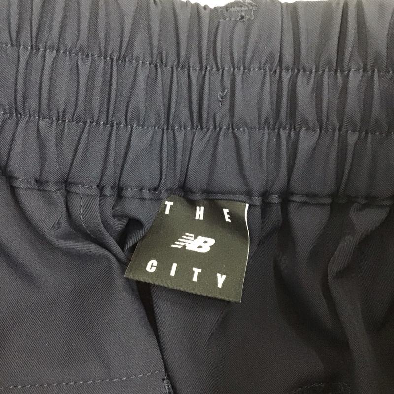 ニューバランス New Balance ボトムス ボトムス JWPL2201 THE CITY ワイドパンツ M ロゴ、文字 紺 / ネイビー /  レディース USED 古着 中古 10112464