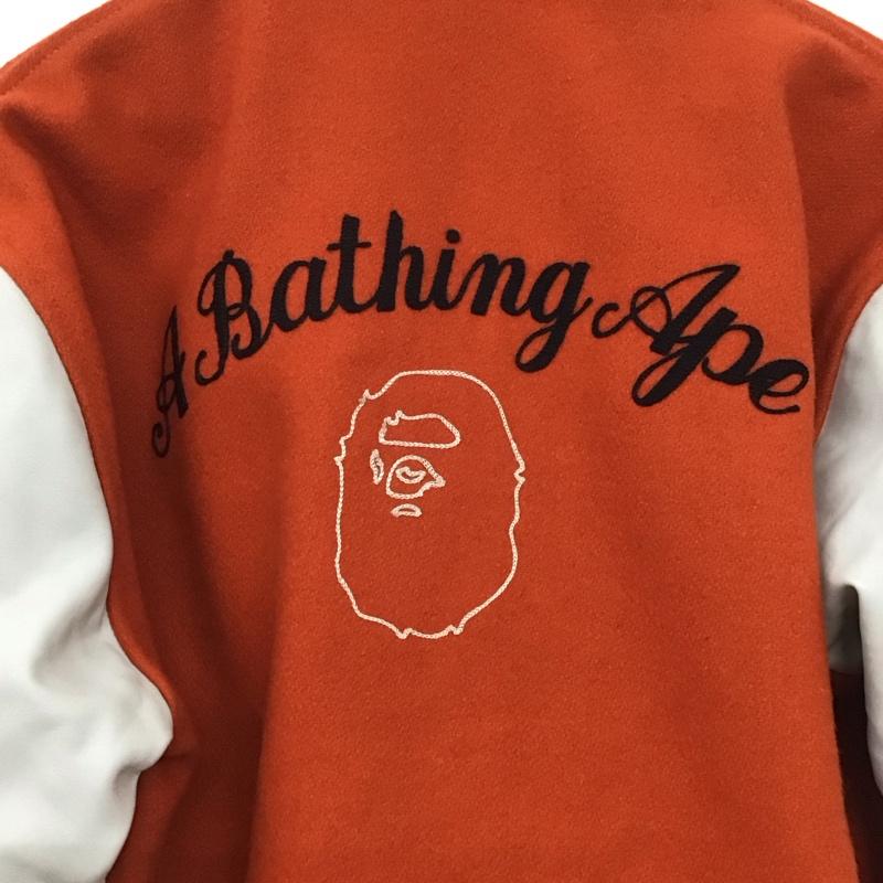 アベイシングエイプ A BATHING APE ジャケット、上着 ジャンパー、ブルゾン スタジャン アウター 古着 前ボタン postoveralls 96-97s L ロゴ、文字 橙 / オレンジ /  メンズ USED 古着 中古 10148160
