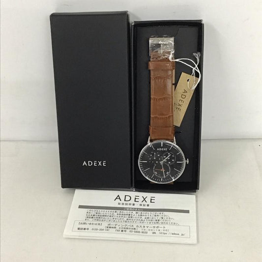 アデクス ADEXE 腕時計 アナログ（クォーツ式） 1868A-04 レザーバンド ロゴ、文字 茶 / ブラウン / X 黒 / ブラック /  メンズ USED 古着 中古 10134643