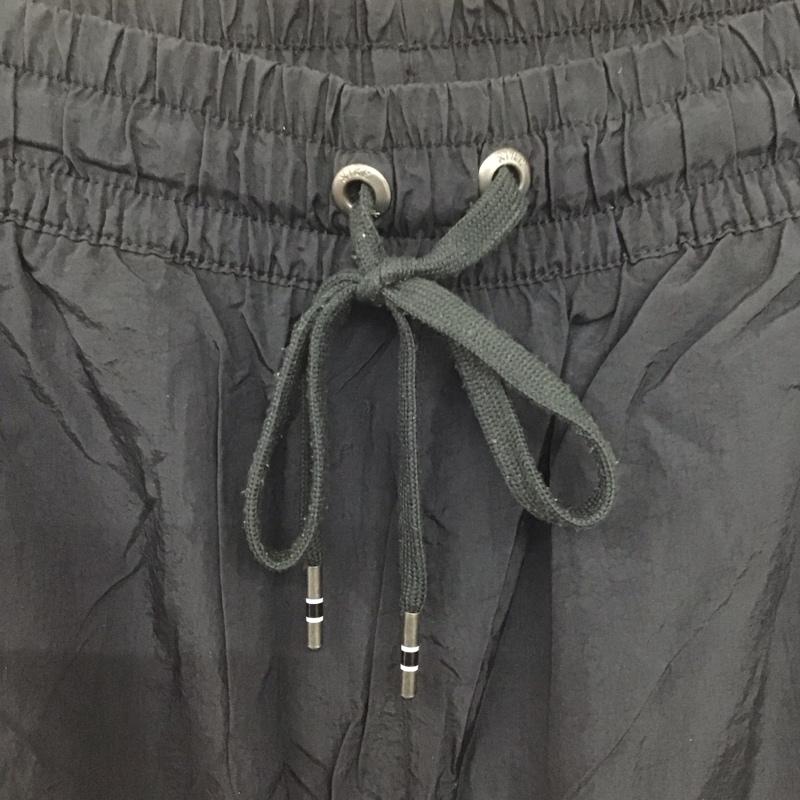 ナイキ NIKE パンツ ワークパンツ、ペインターパンツ bv5371-082 ウーブンパンツ ワイドパンツ M ロゴ、文字 黒 / ブラック /  メンズ USED 古着 中古 10146726