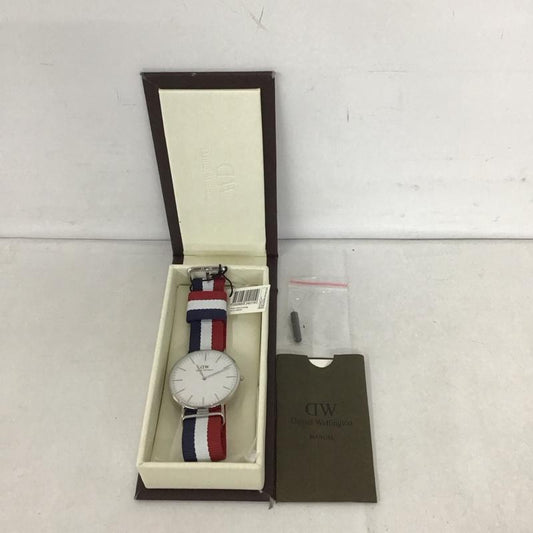 ダニエルウェリントン Daniel Wellington 腕時計 アナログ（クォーツ式） 0203DW 箱有 ロゴ、文字 紺 / ネイビー / X 白 / ホワイト / X 赤 / レッド /  メンズ USED 古着 中古 10134485
