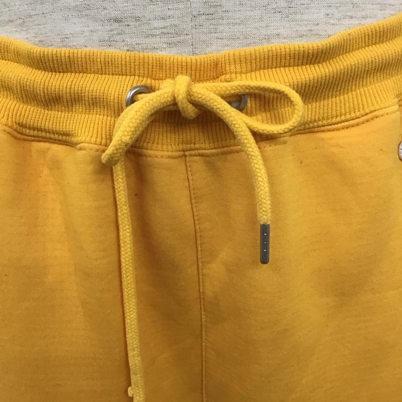チャンピオン Champion ボトムス ボトムス C8-P205 Champion×X-LARGE REVERSEWEAVEPANT スウェットパンツ コラボ M ロゴ、文字 黄 / イエロー /  メンズ USED 古着 中古 10110333