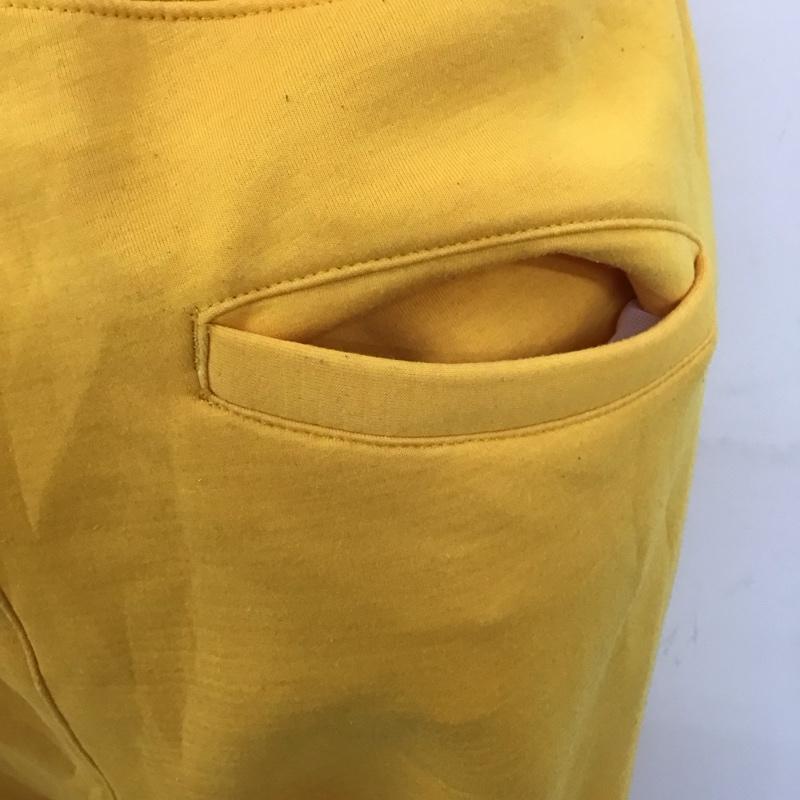 チャンピオン Champion ボトムス ボトムス C8-P205 Champion×X-LARGE REVERSEWEAVEPANT スウェットパンツ コラボ M ロゴ、文字 黄 / イエロー /  メンズ USED 古着 中古 10110333
