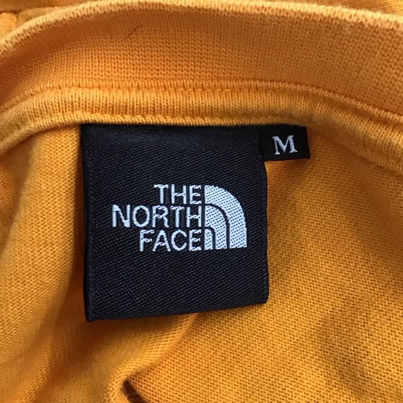 ザノースフェイス THE NORTH FACE Tシャツ 半袖 nt32010 半袖カットソー プリントTシャツ クルーネックカットソー M ロゴ、文字 橙 / オレンジ /  メンズ USED 古着 中古 10123999